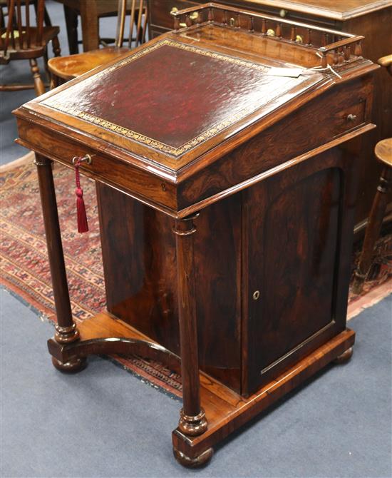 An early Victorian rosewood davenport, H.83cm